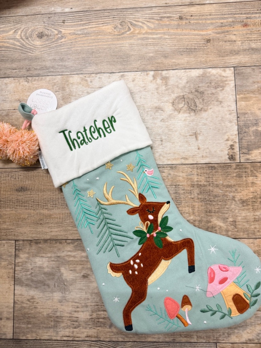 PERSONALIZED WITH THATCHER 
= Stephen Joseph Reindeer Christmas Stocking